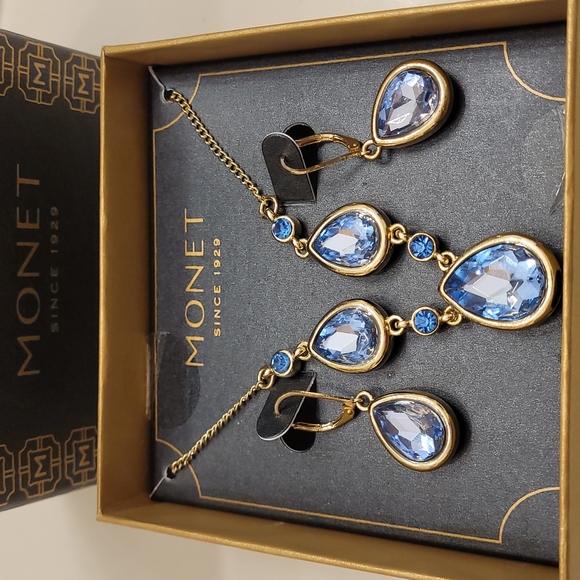 Monet Jewelry - Monet gold tone blue stone set of necklace and earrings in a box.